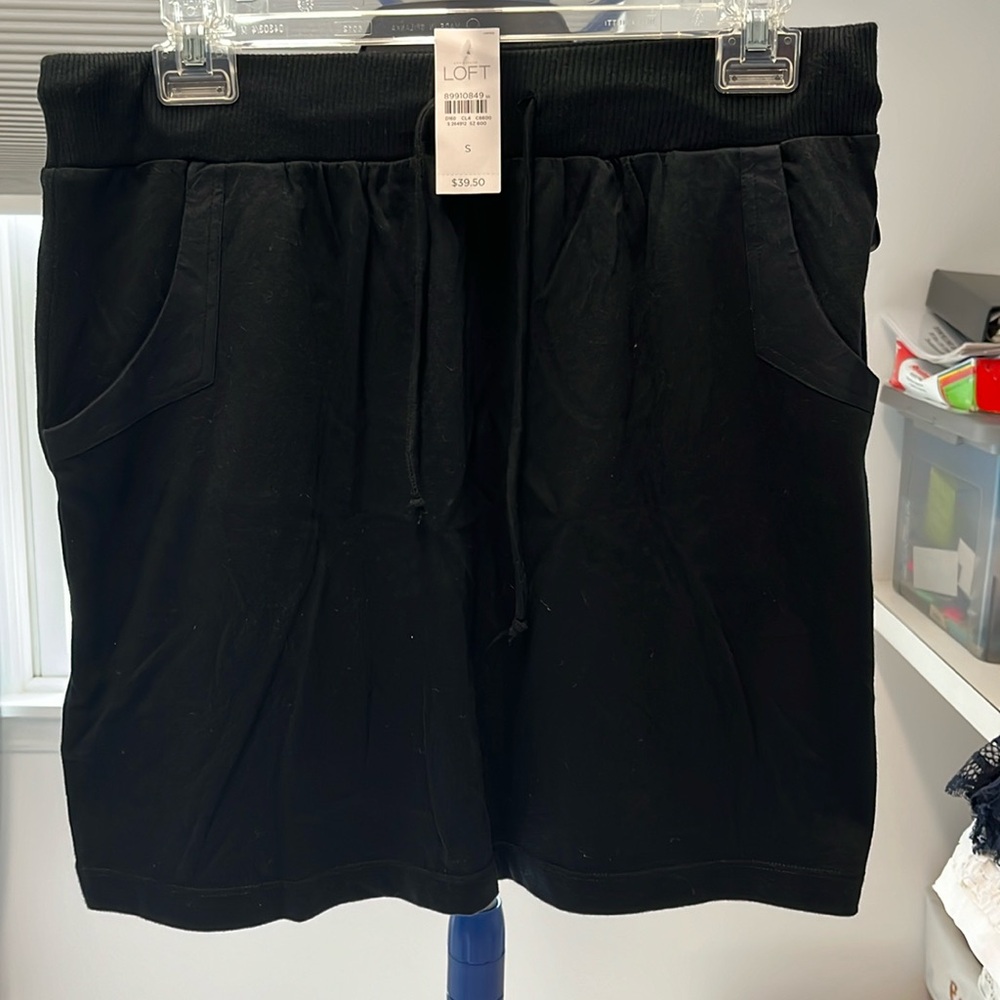 Never worn loft black skirt with draw string. . Size s. Pockets.